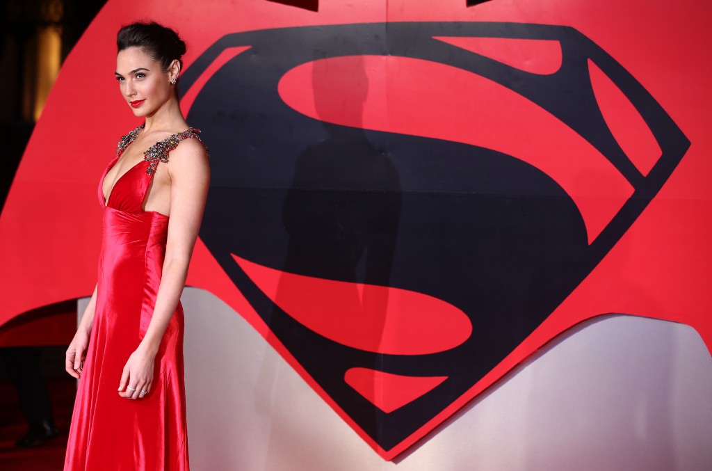 Israeli actress Gal Gadot poses for a photograph after arriving to attend the European Premiere of the film "Batman v Superman: Dawn of Justice", in central London on March 22, 2016. / AFP / JUSTIN TALLIS
