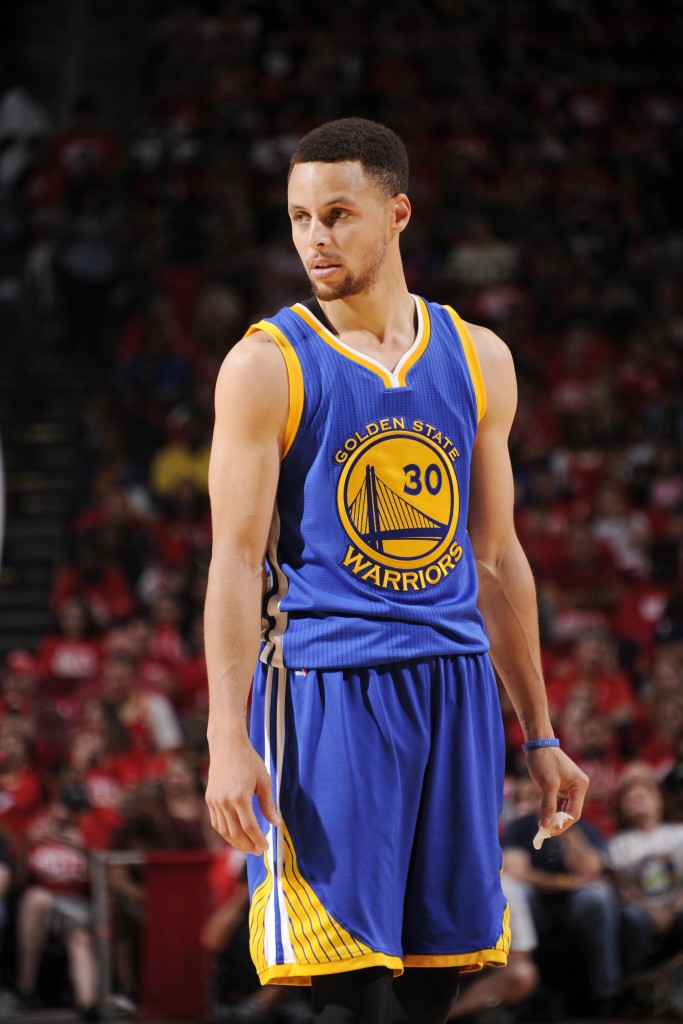 HOUSTON, TX - APRIL 24: Stephen Curry #30 of the Golden State Warriors stands on the court during the game against the Houston Rockets in Game Four of the Western Conference Quarterfinals during the 2016 NBA Playoffs on April 24, 2016 at the Toyota Center in Houston, Texas. NOTE TO USER: User expressly acknowledges and agrees that, by downloading and or using this photograph, User is consenting to the terms and conditions of the Getty Images License Agreement. Mandatory Copyright Notice: Copyright 2016 NBAE   Bill Baptist/NBAE via Getty Images/AFP