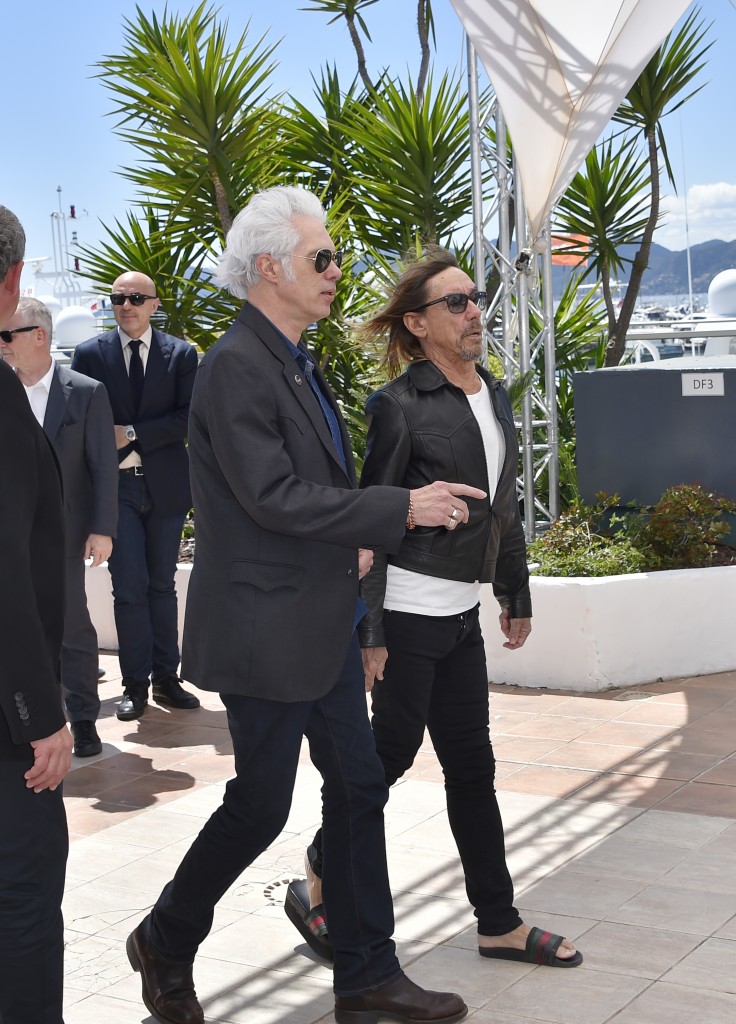 US director Jim Jarmusch (L) and US singer Iggy Pop arrive on May 19, 2016 to attend a photocall for the film "Gimme Danger" at the 69th Cannes Film Festival in Cannes, southern France. / AFP PHOTO / LOIC VENANCE