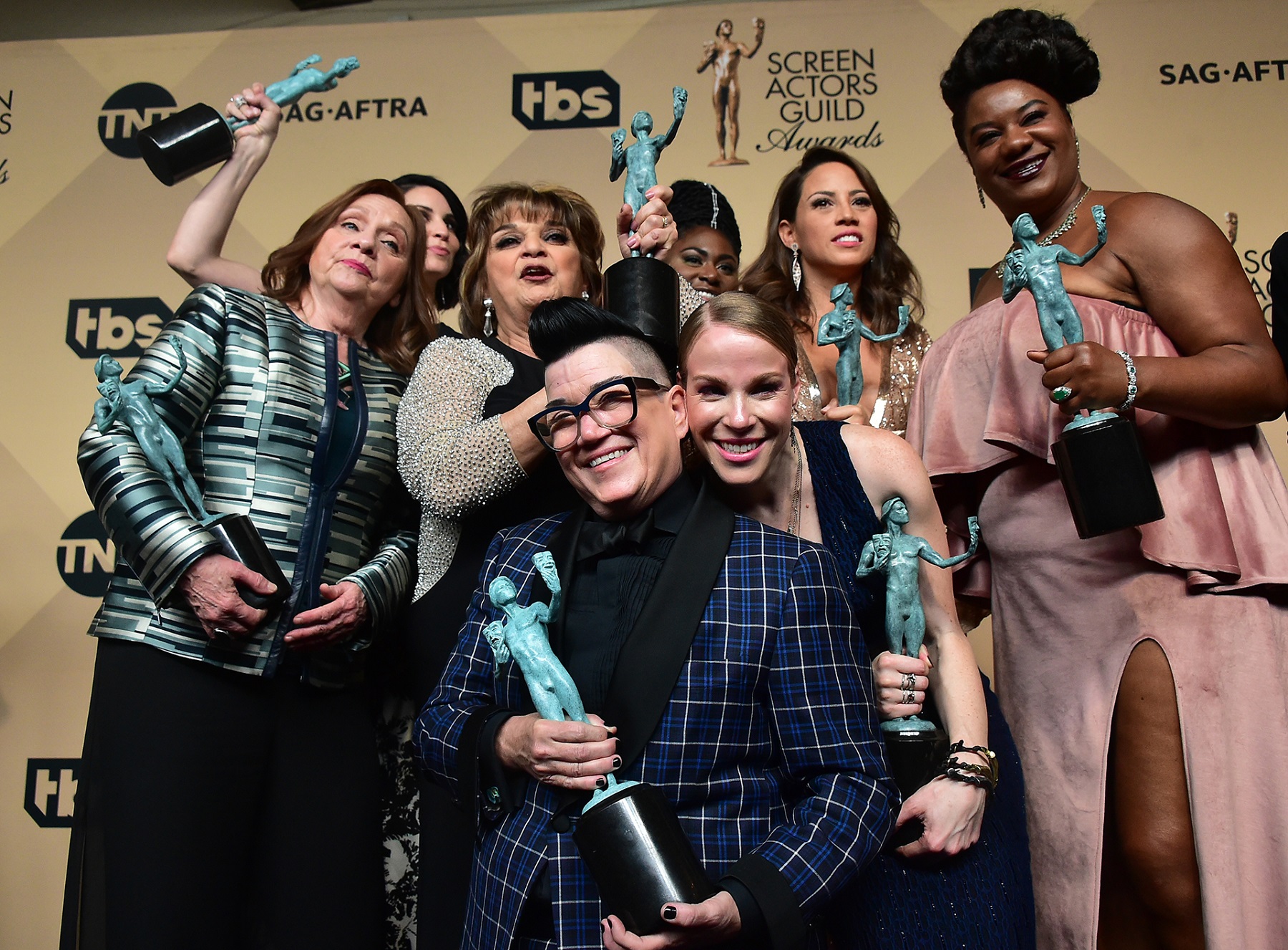 "Orange Is the New Black" cast members, winners of the Outstanding Performance by an Ensemble in a Comedy Series award, pose in the press room during the 23rd Annual Screen Actors Guild Awards at the Shrine Exposition Center on January 29, 2017 in Los Angeles, California. / AFP PHOTO / FREDERIC J. BROWN